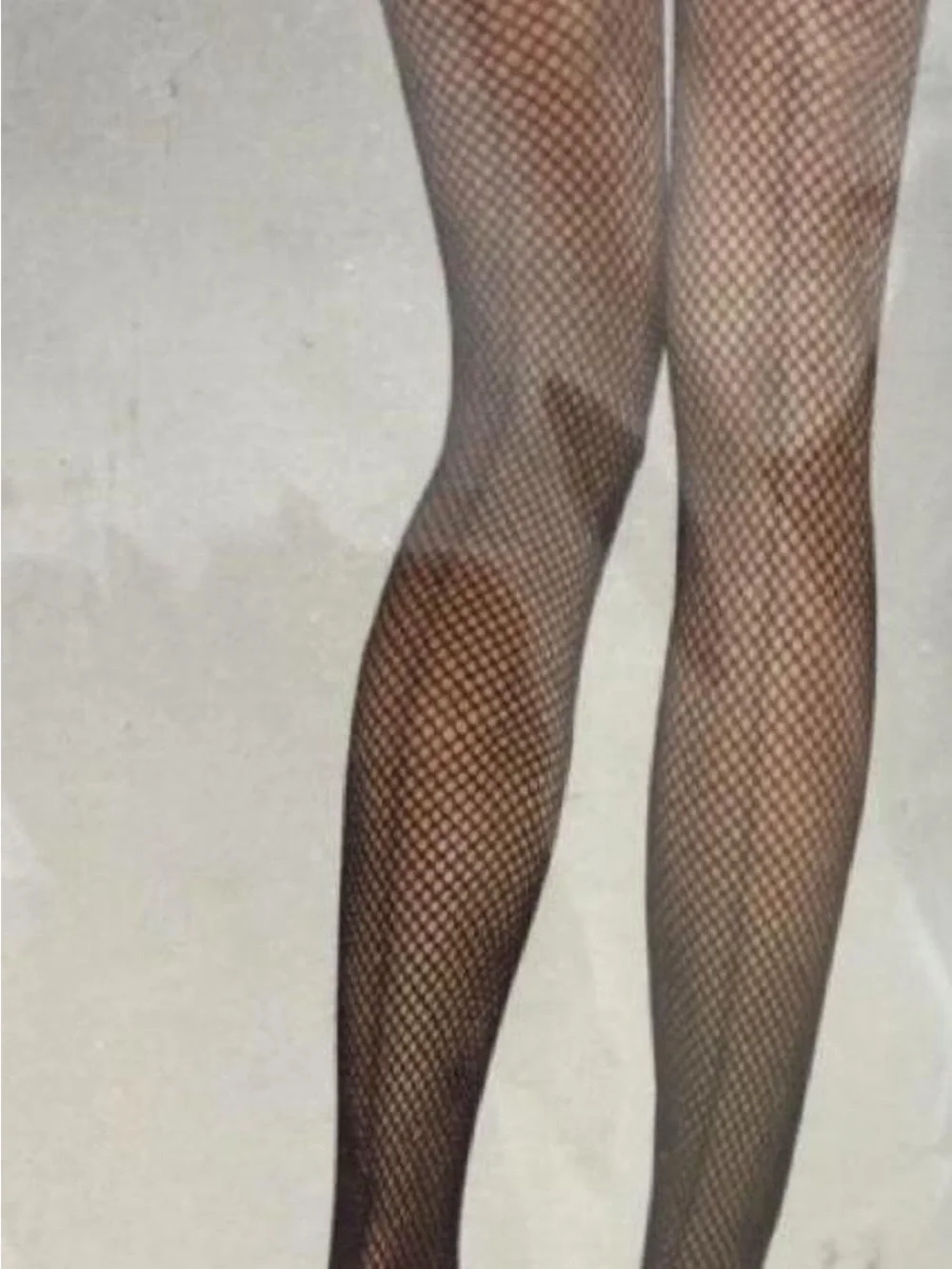 Black fishnet thigh high stockings